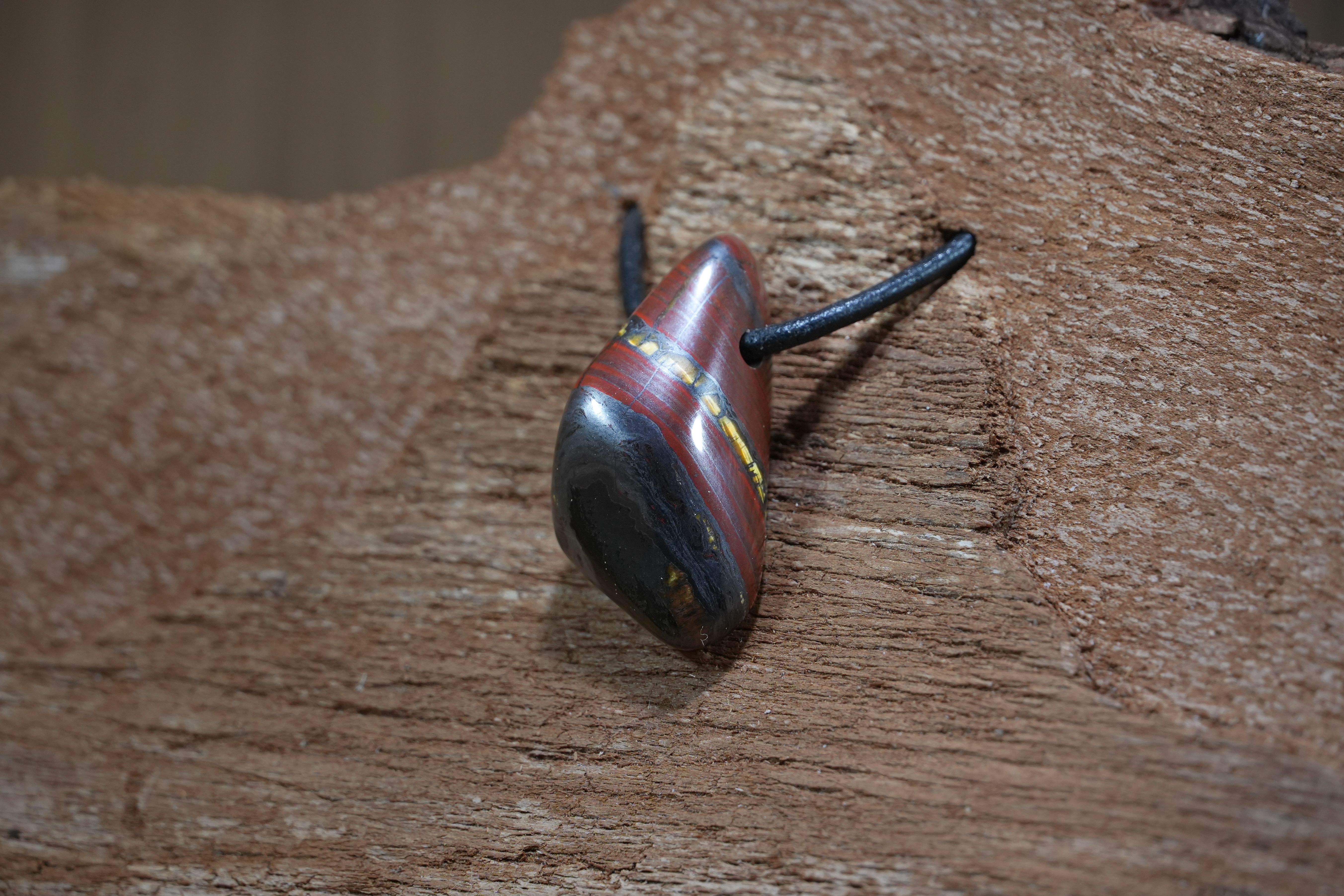 Tiger iron, Drilled · No. 1, 1.7 × 3.4 cm