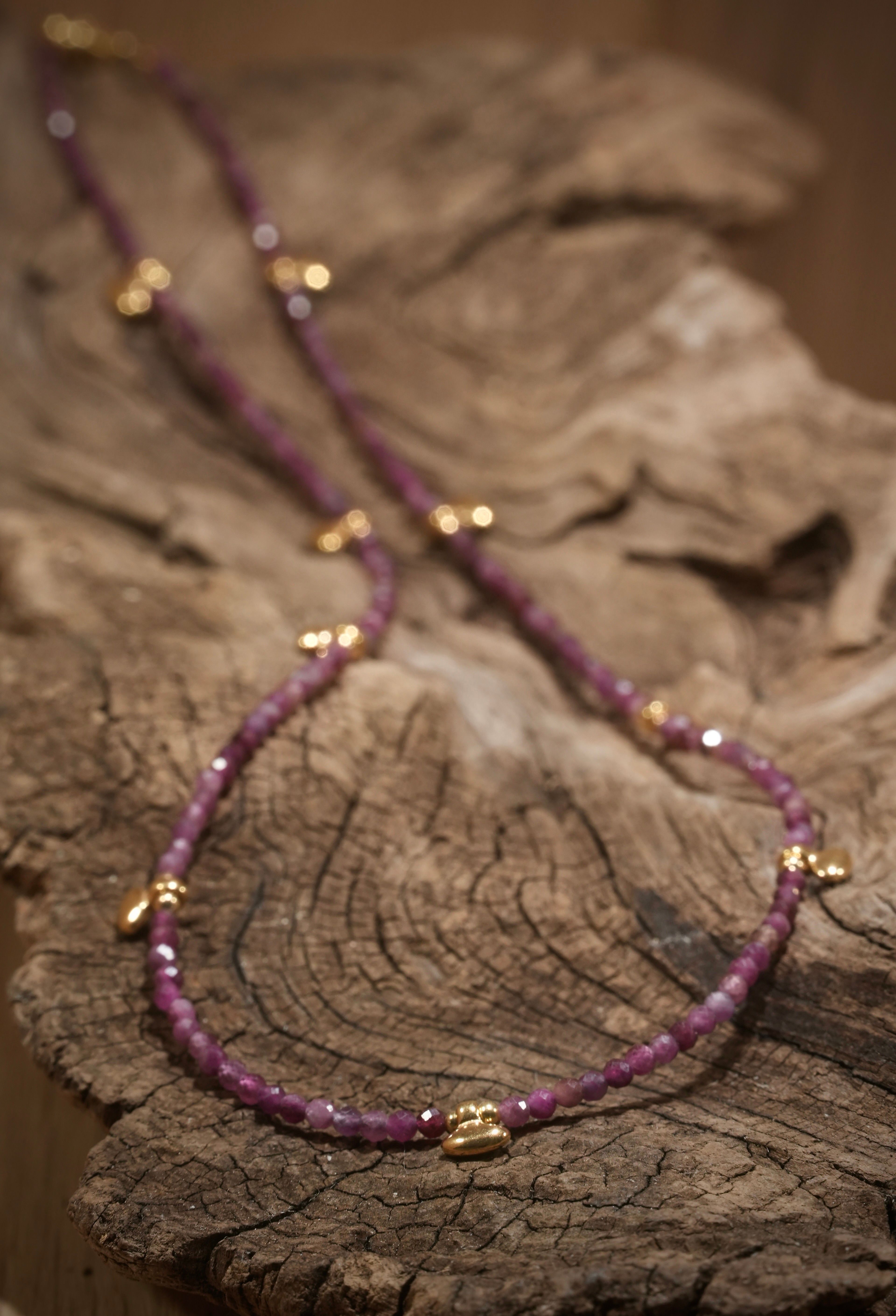 Ruby boho necklace with small gold-plated parts