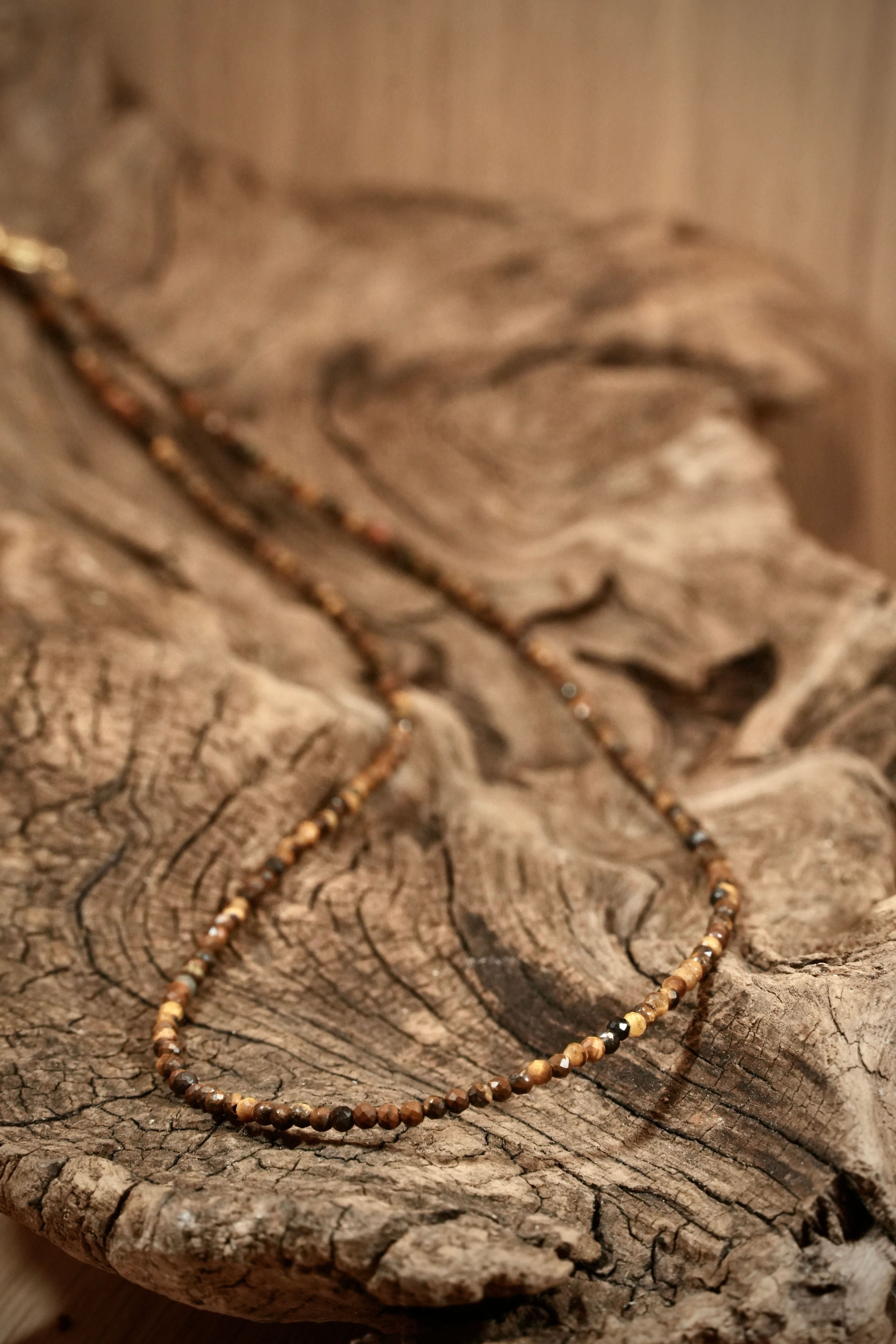 Tiger's eye Pearls necklace on root wood