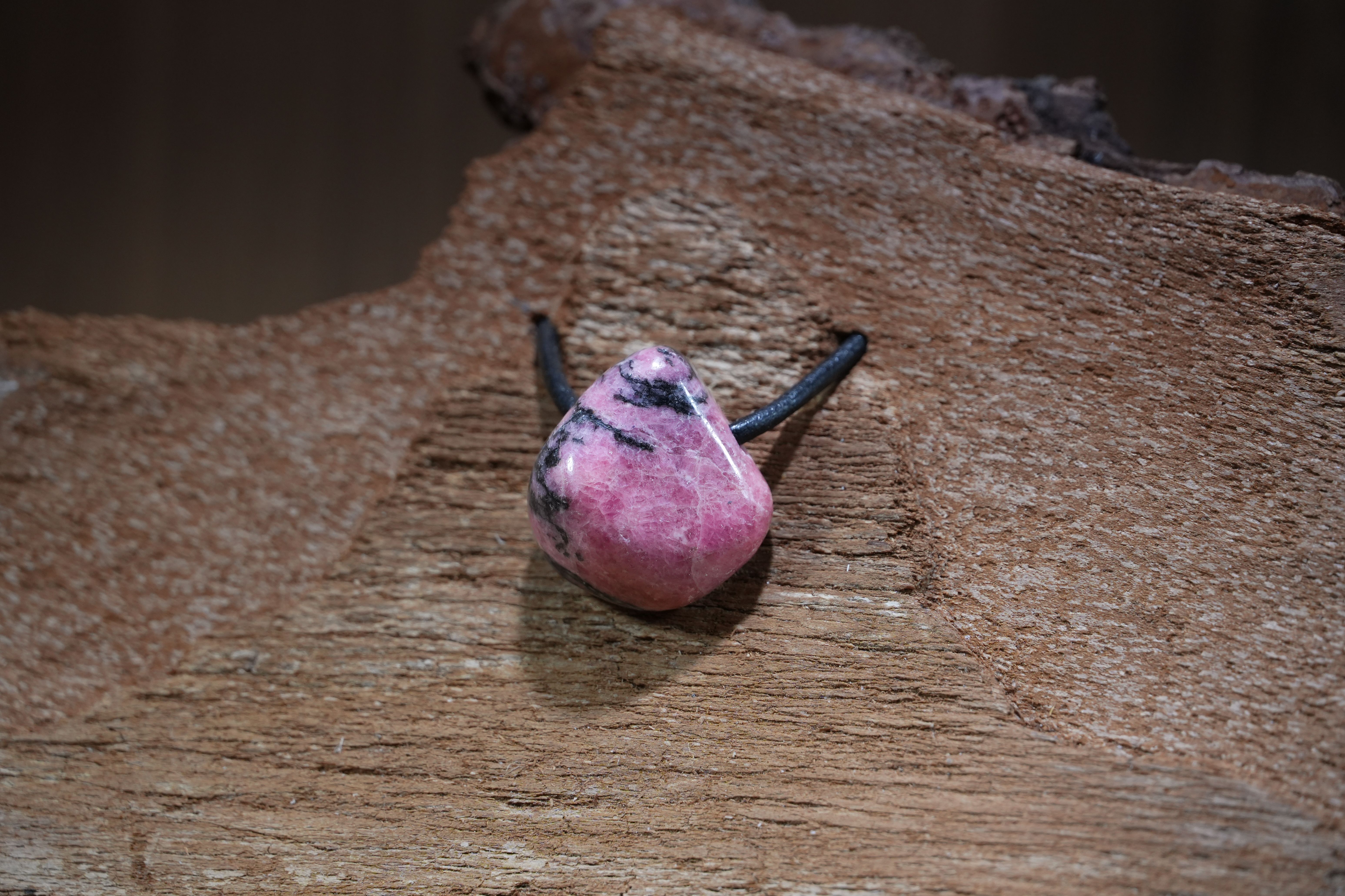 Rhodonite, Drilled · No. 1, 2.2 × 3.5 cm