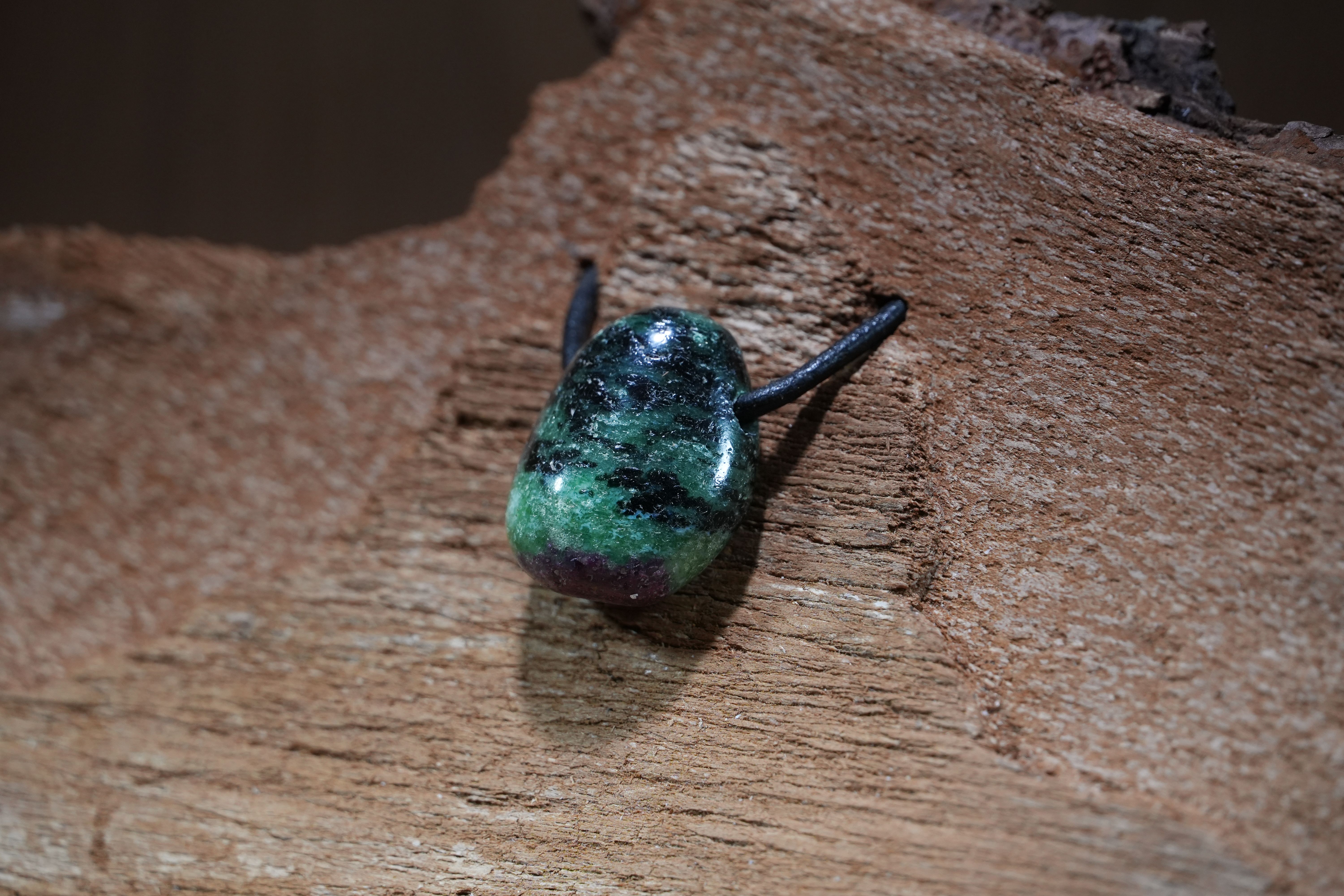 Zoisite with ruby, Drilled · No. 1, 2 × 2.5 cm