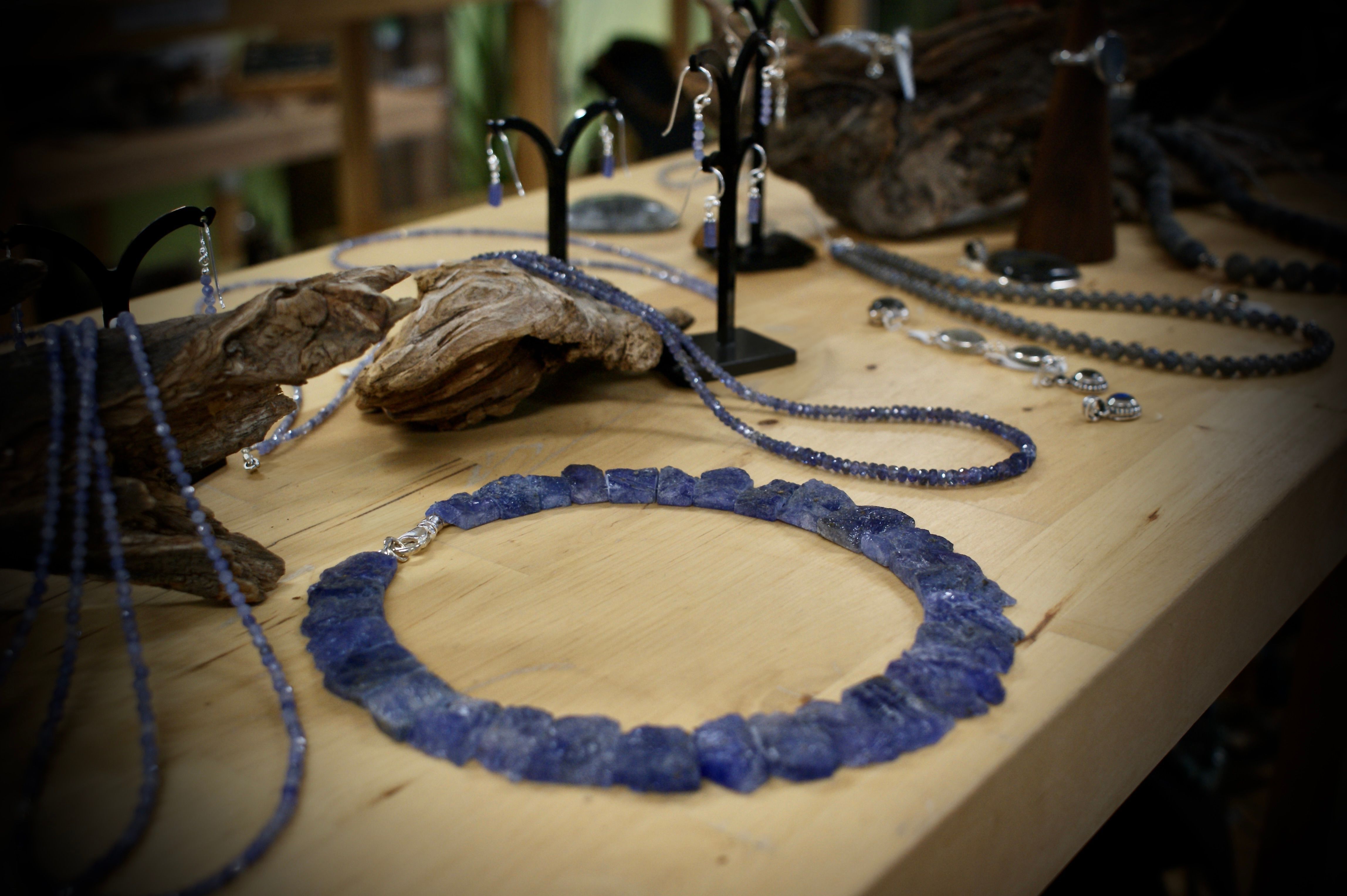 Selection of jewellery on a wooden table