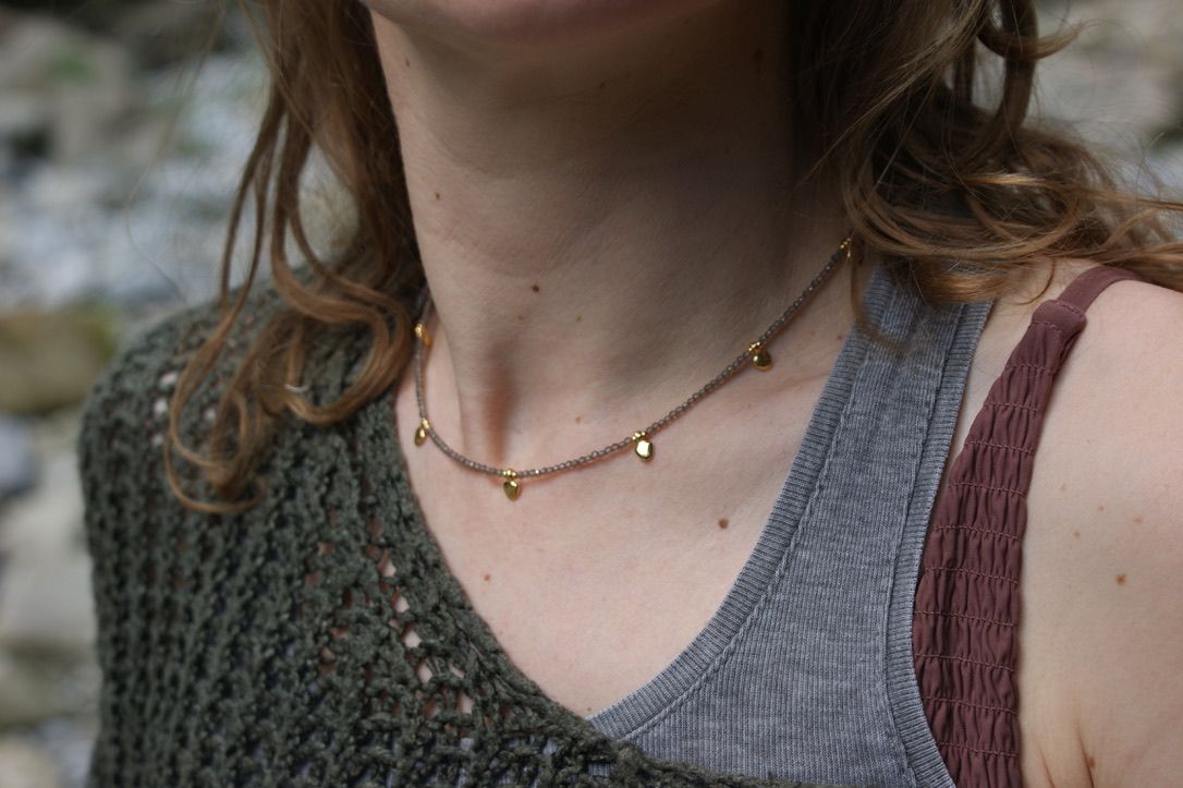 Necklace on a dark jewellery bust