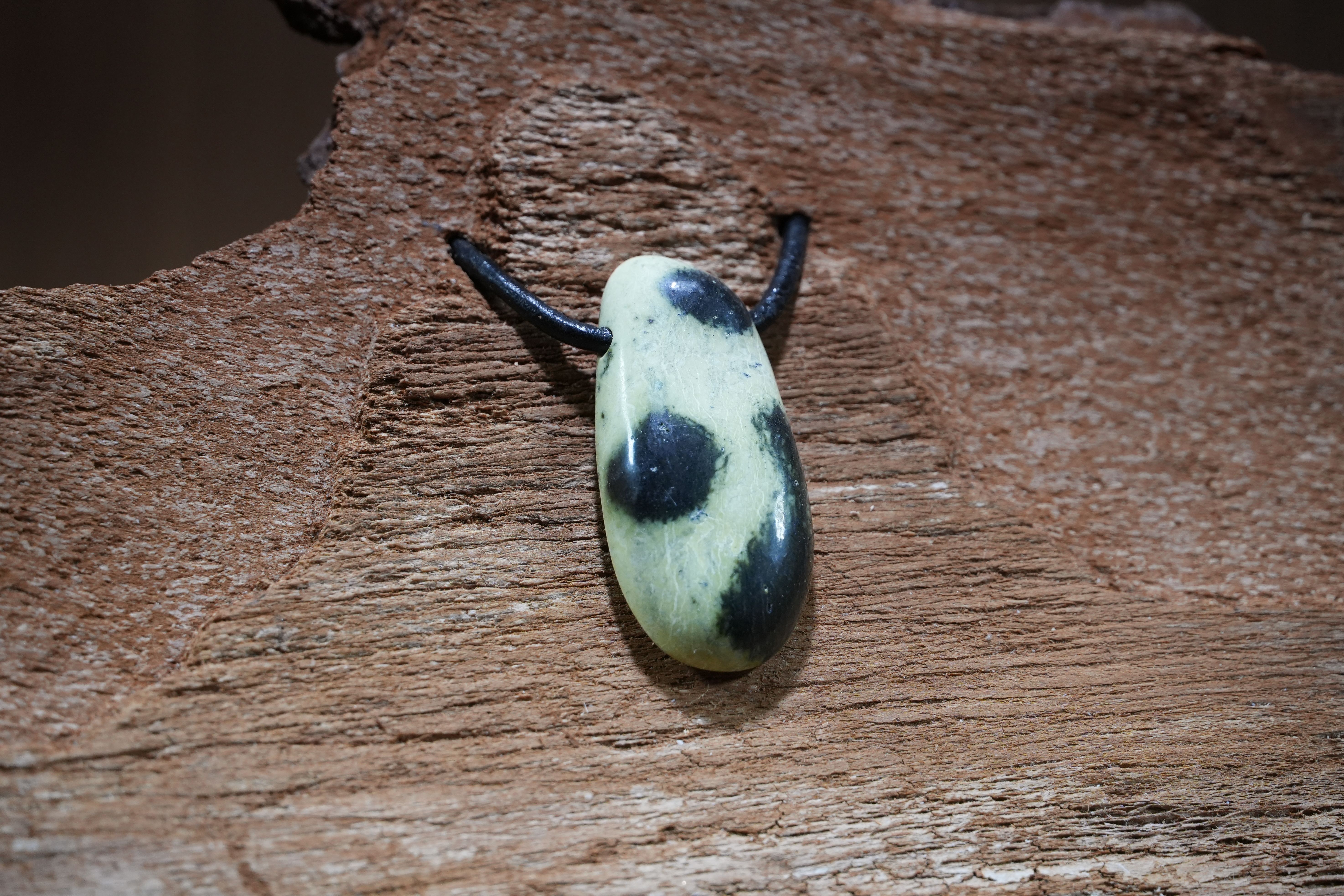 Serpentine Chyta, Drilled · No. 1, 1.9 × 4 cm