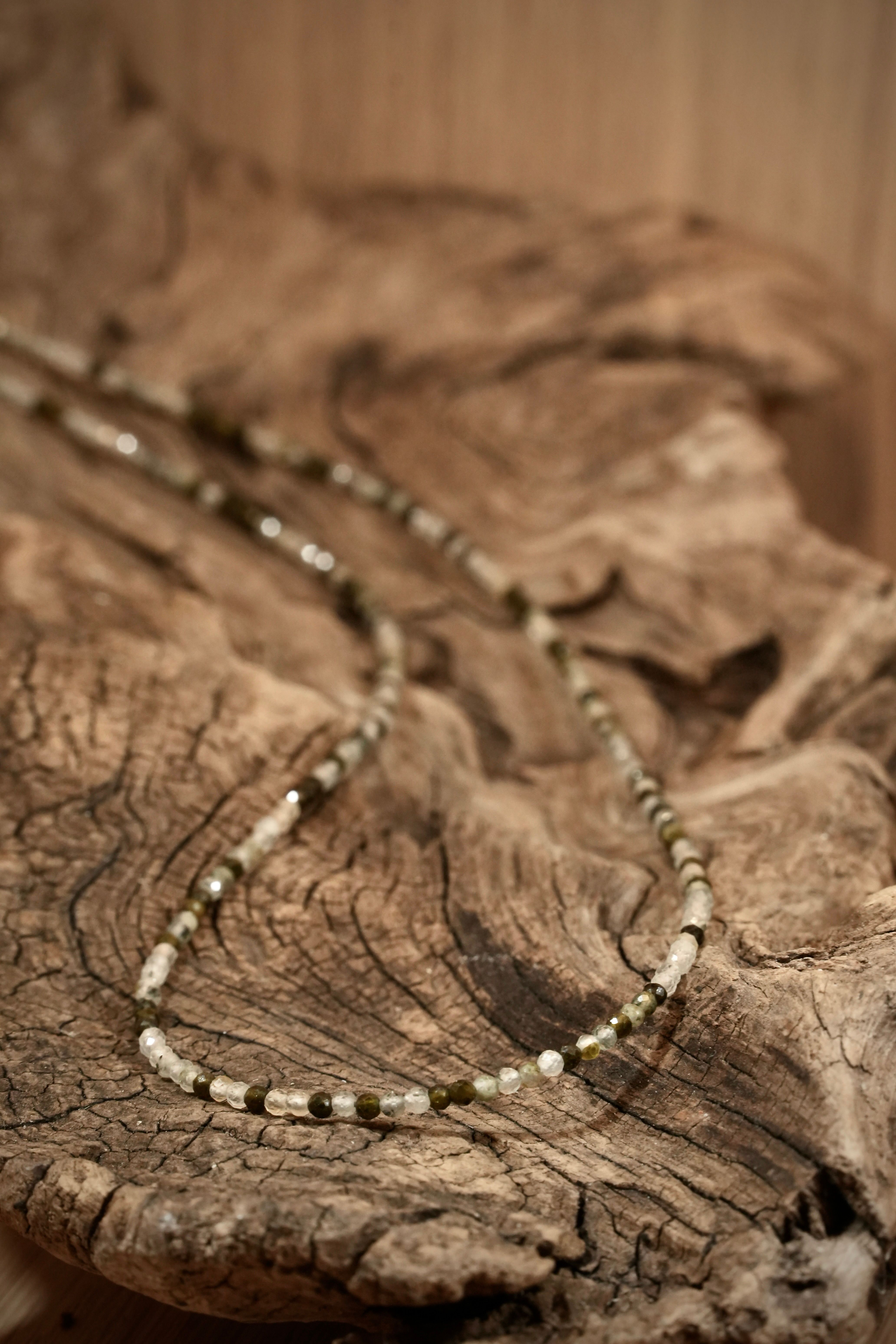 Prehnite Pearls necklace on root wood