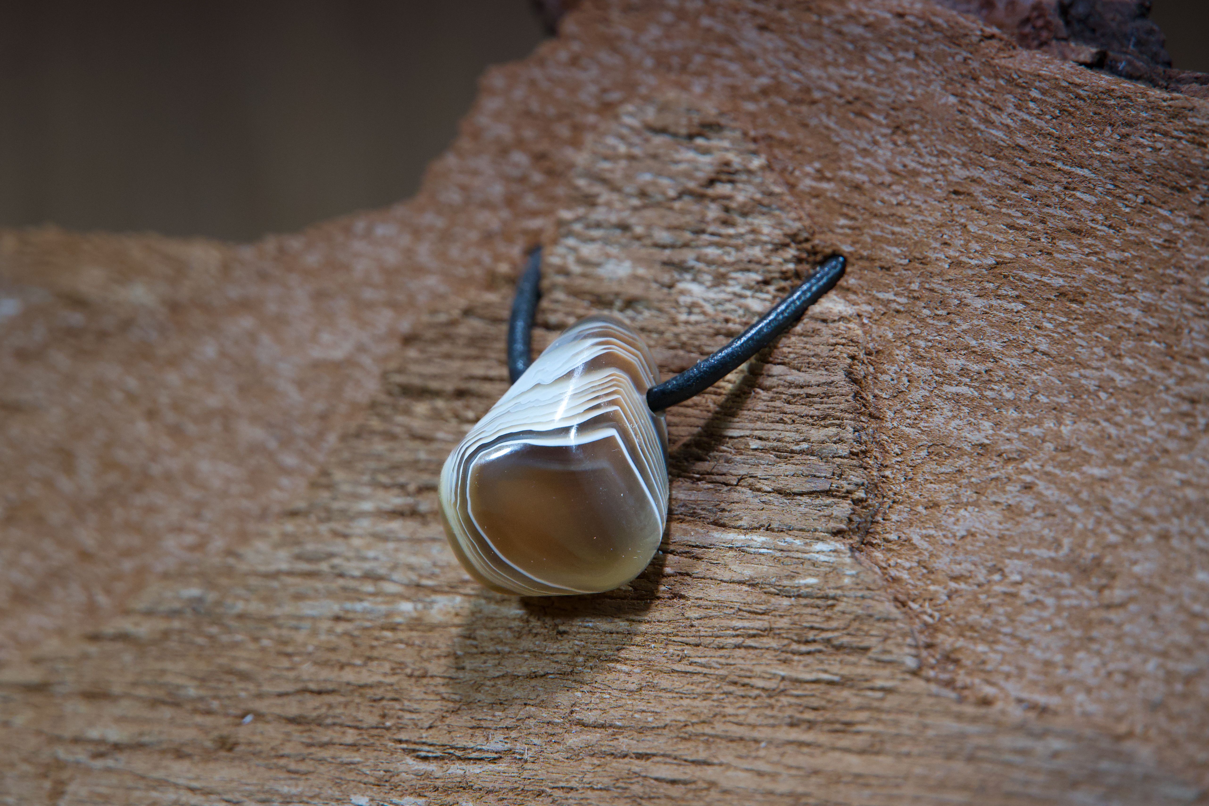 Botswana agate pendant, drilled · No. 1, 1.5 × 2 cm