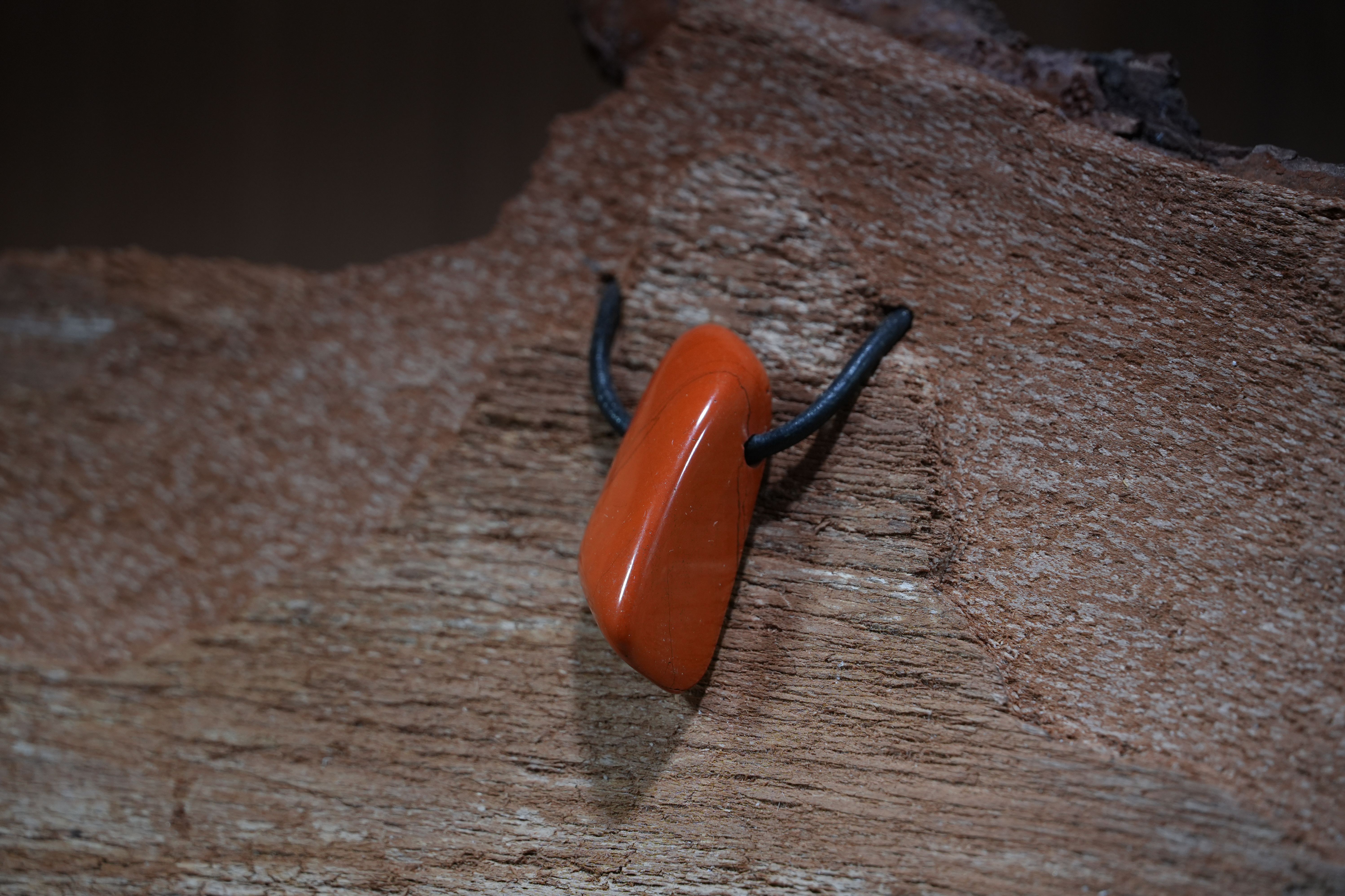 Red jasper, Drilled · No. 1, 1.5 × 3.6 cm
