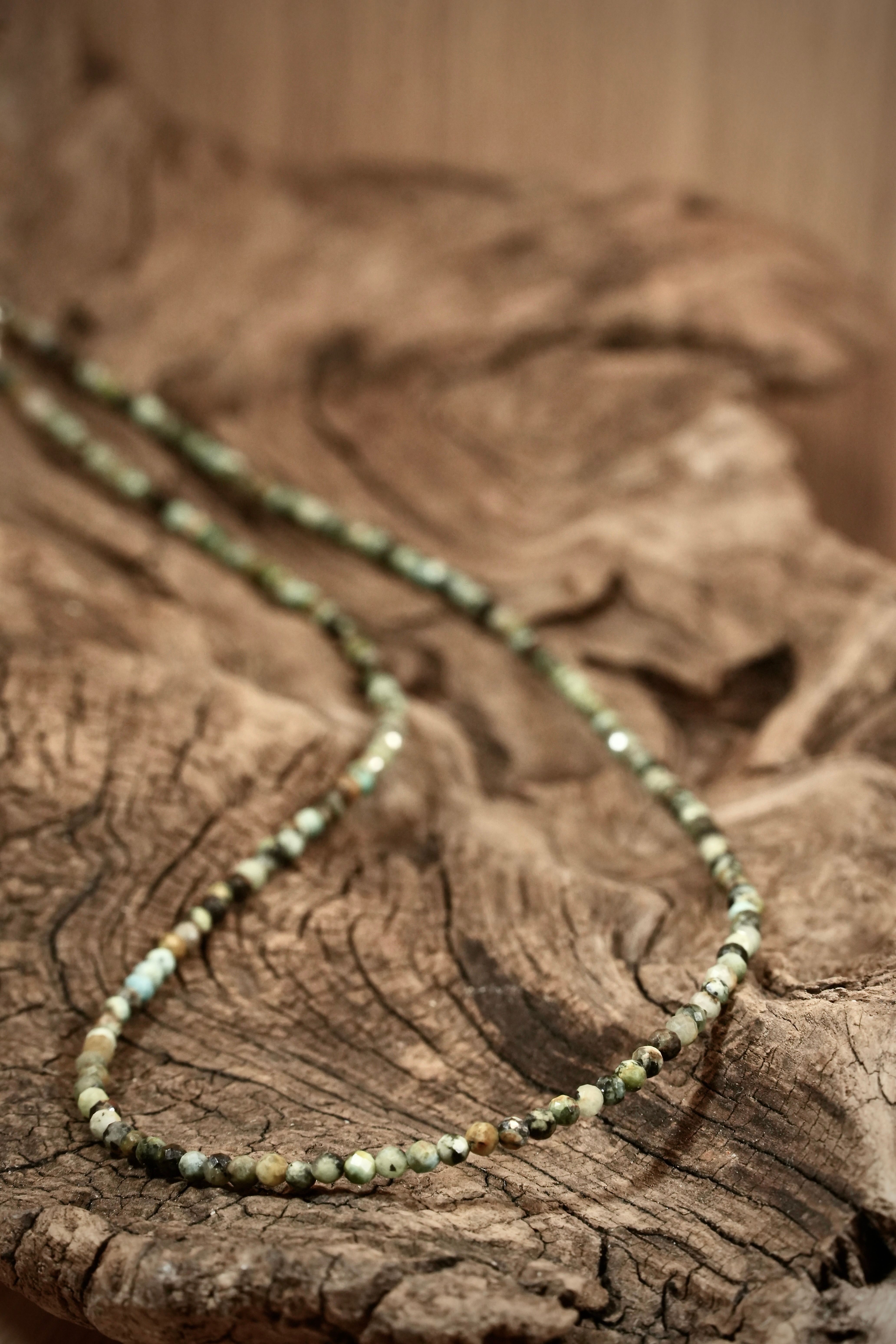 Turquoise Pearls necklace on root wood