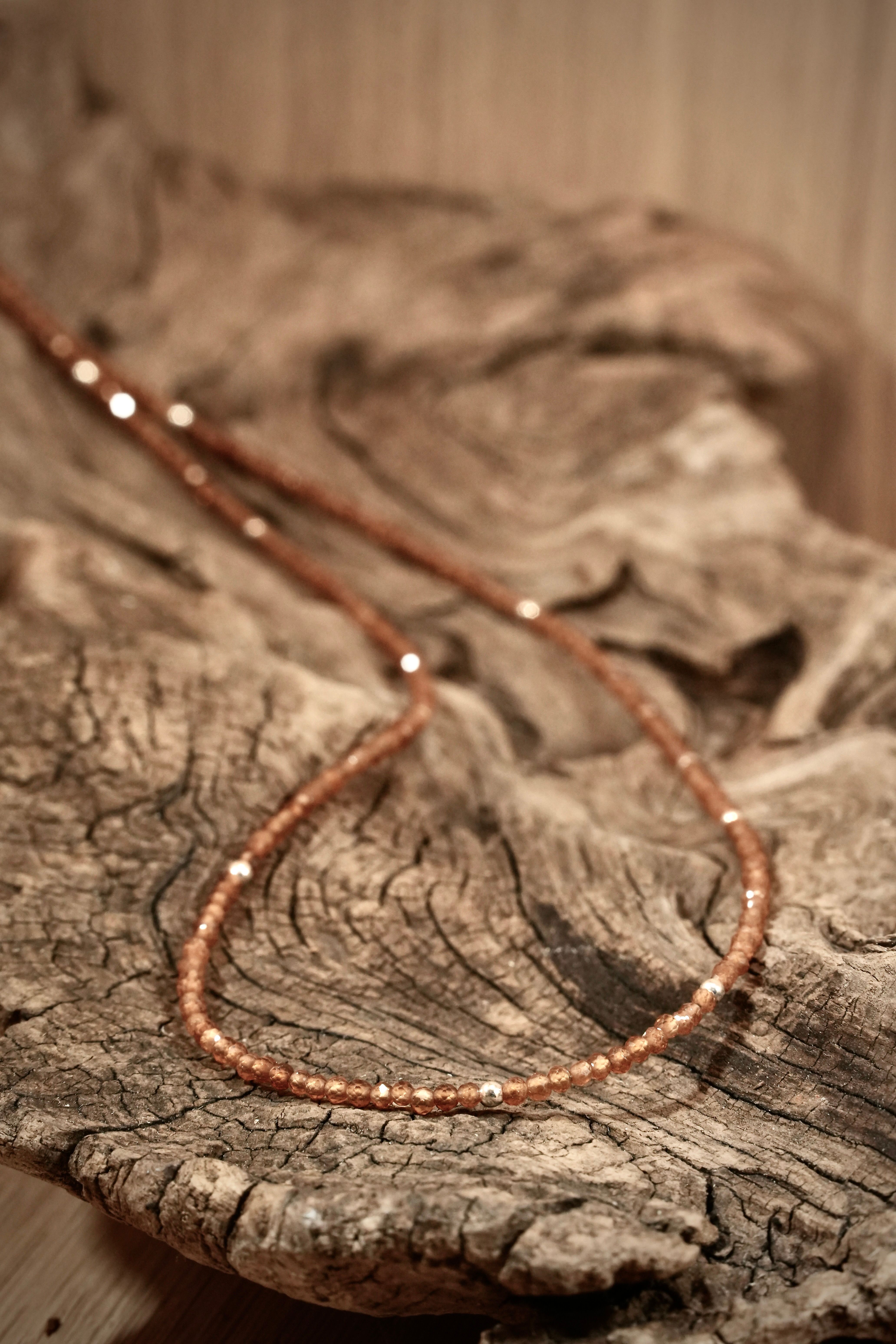 Hessonite bead necklace with silver beads