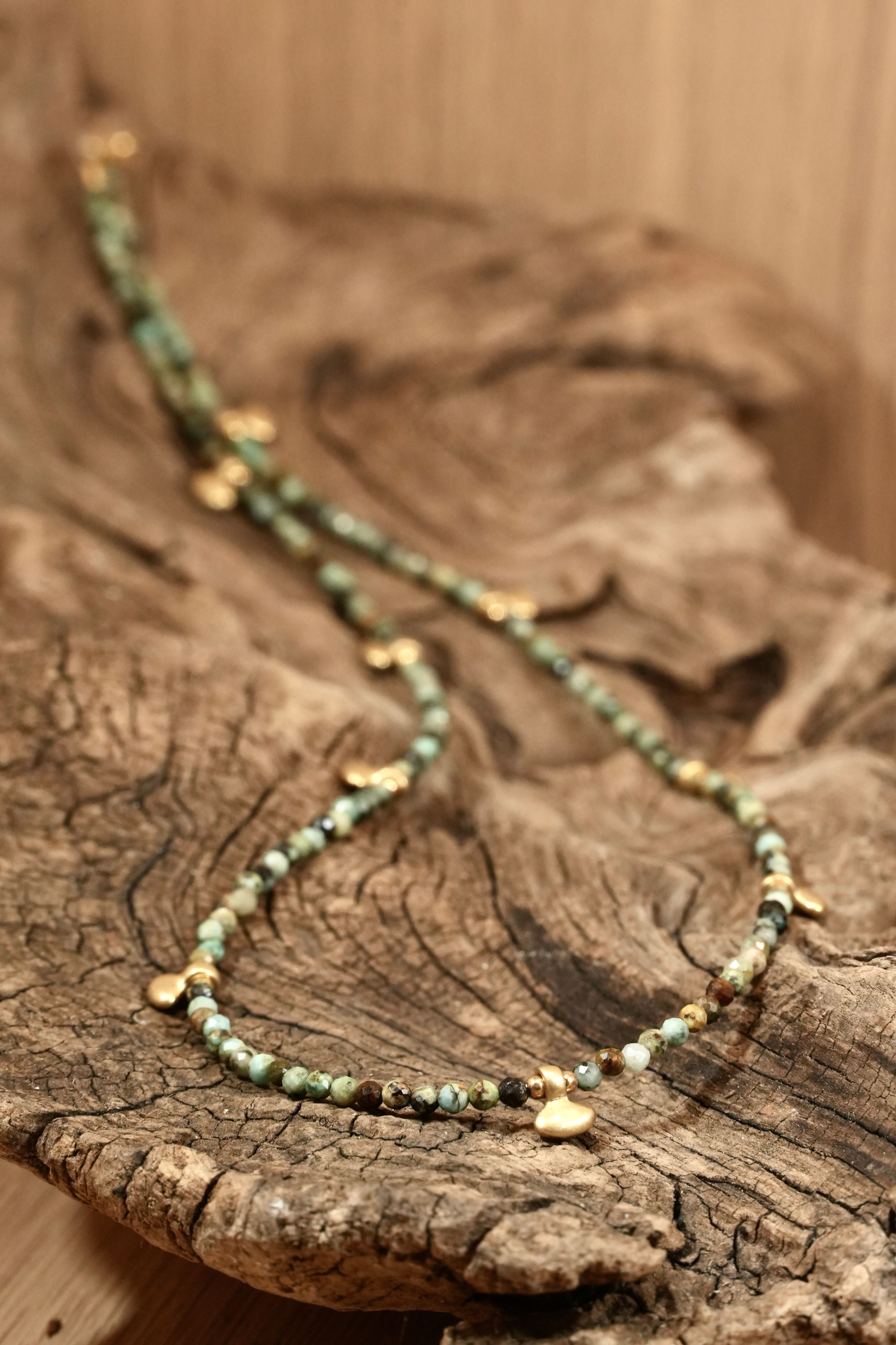 Turquoise Boho necklace with small gold elements