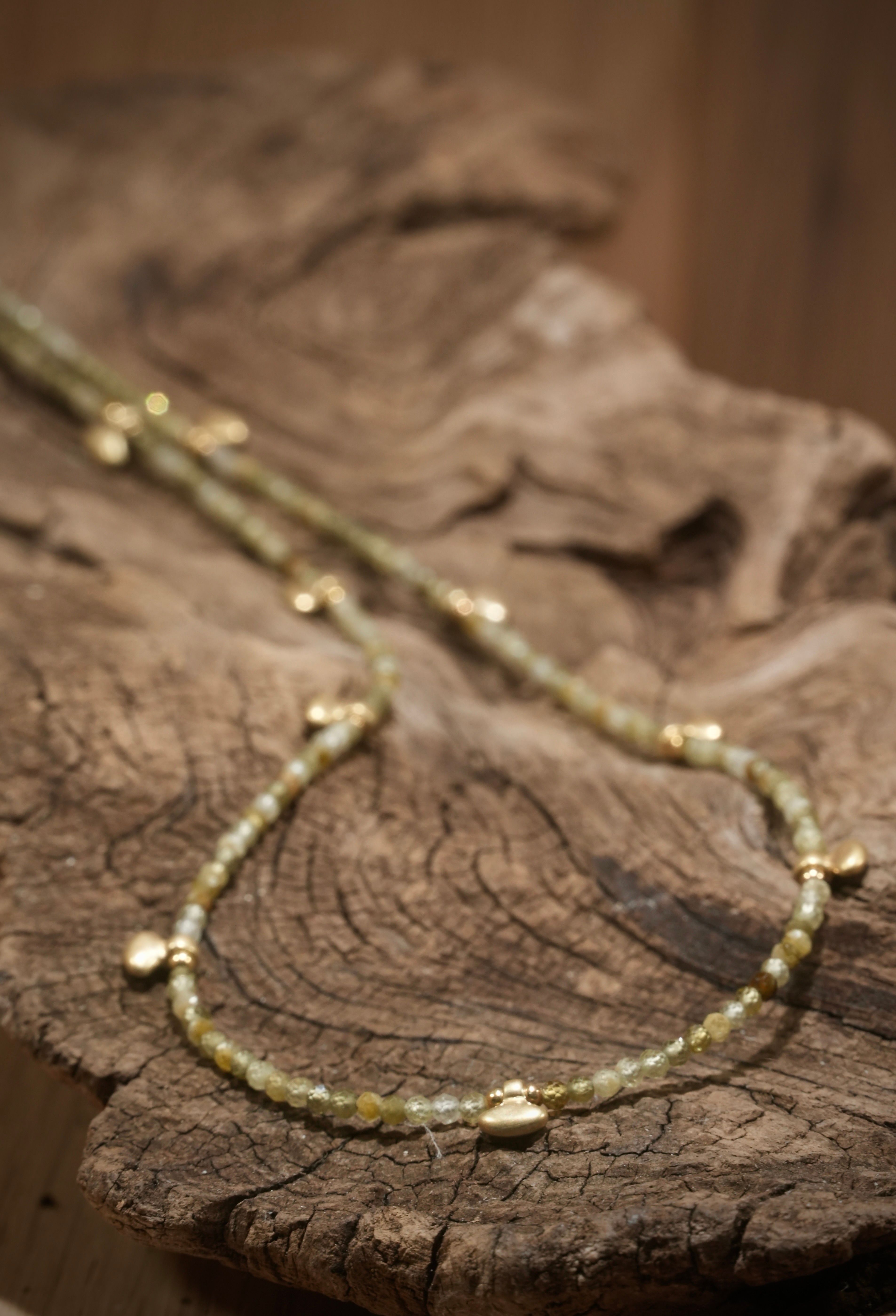 Grossular boho necklace with small gold-plated parts