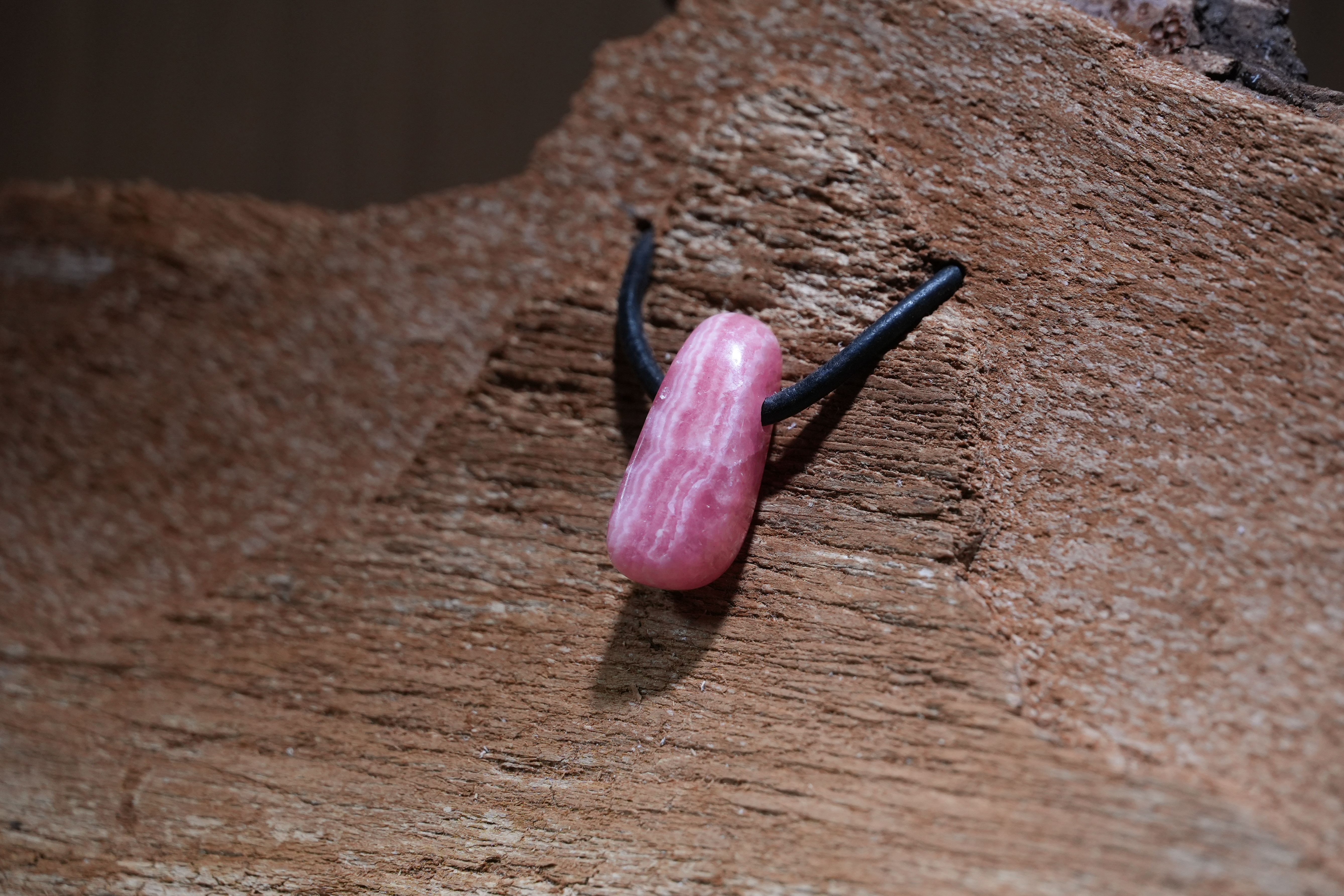 Rhodochrosite, Drilled · No. 1, 1 × 2.4 cm