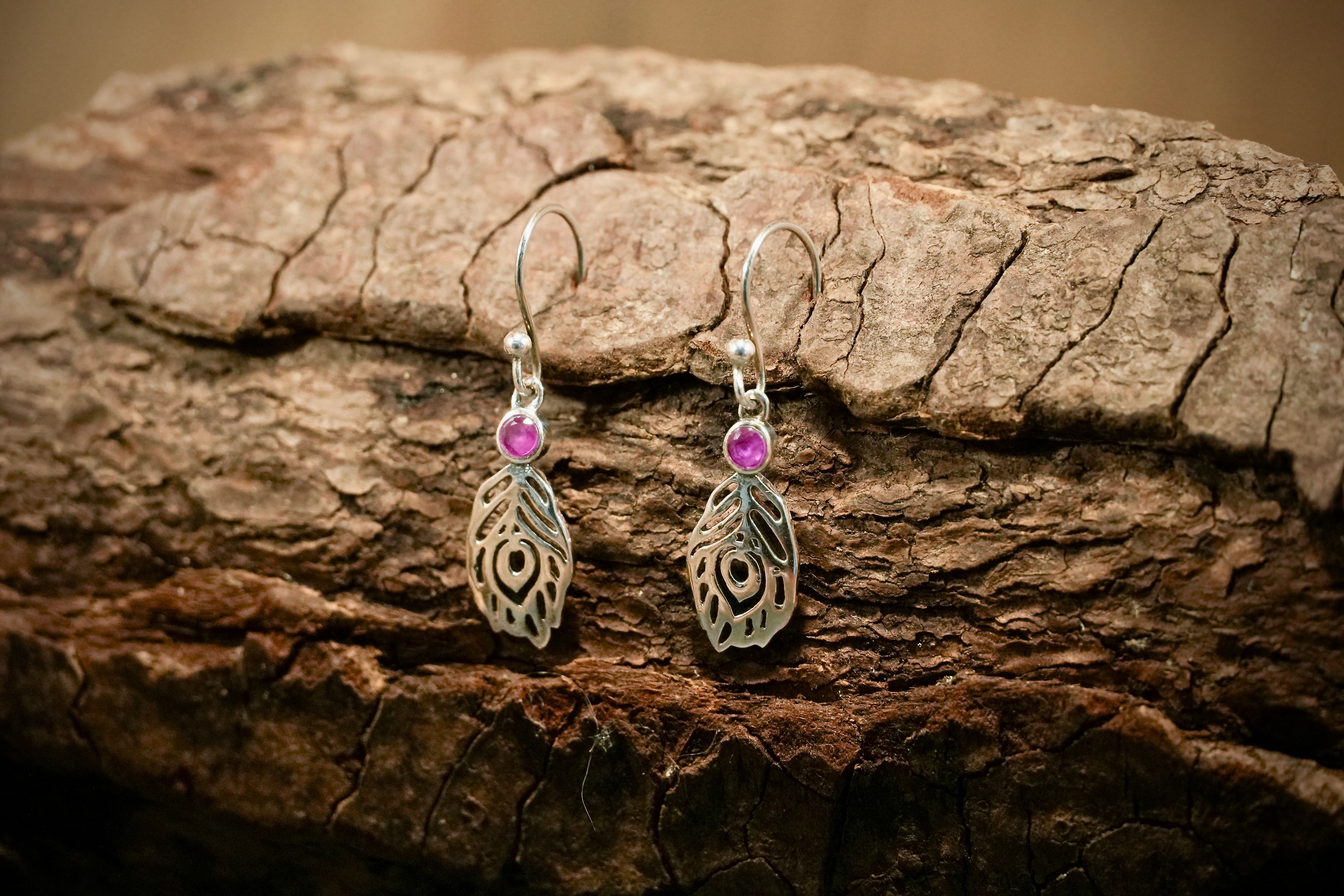 Feather drop earrings with ruby