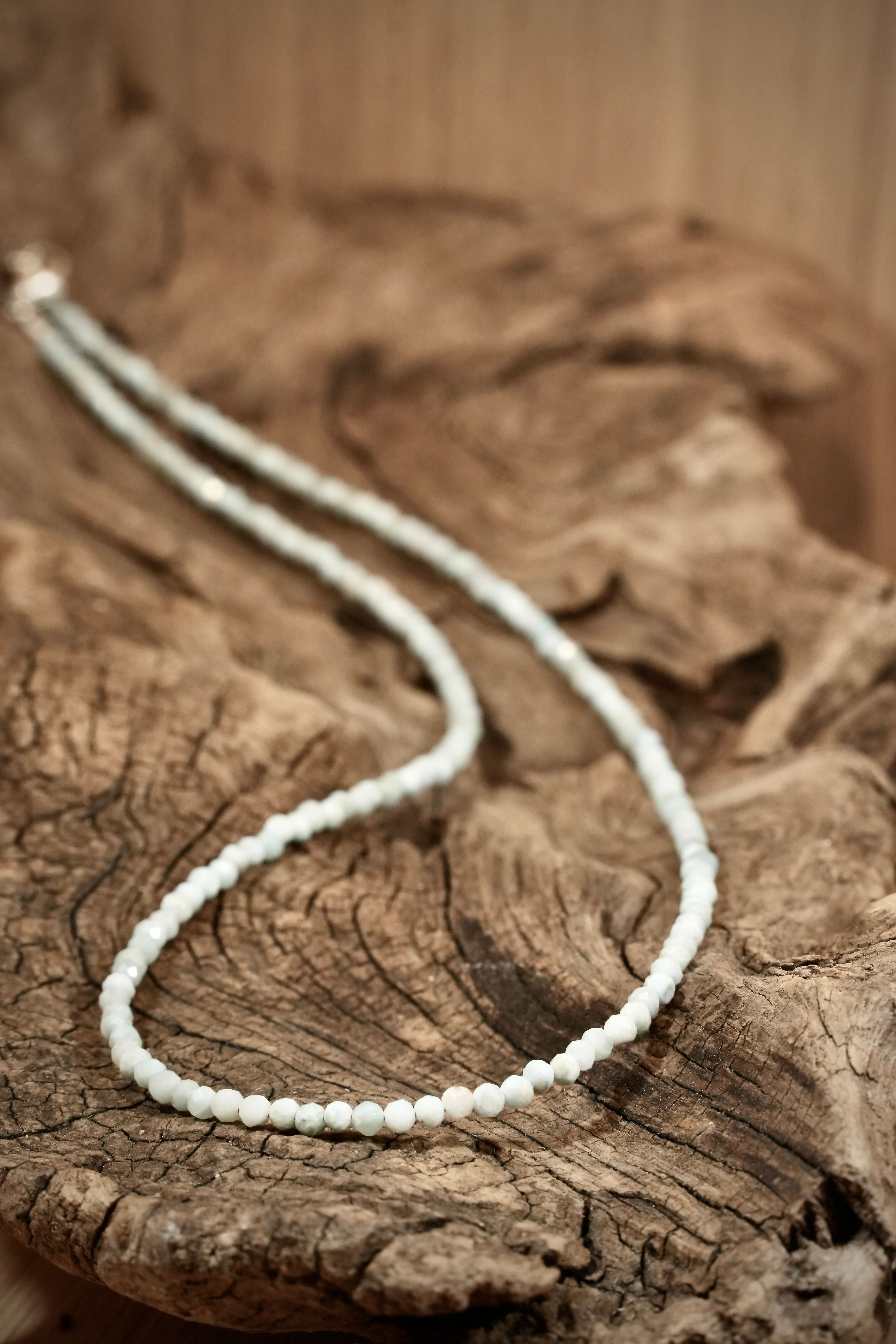Larimar Pearls necklace on root wood
