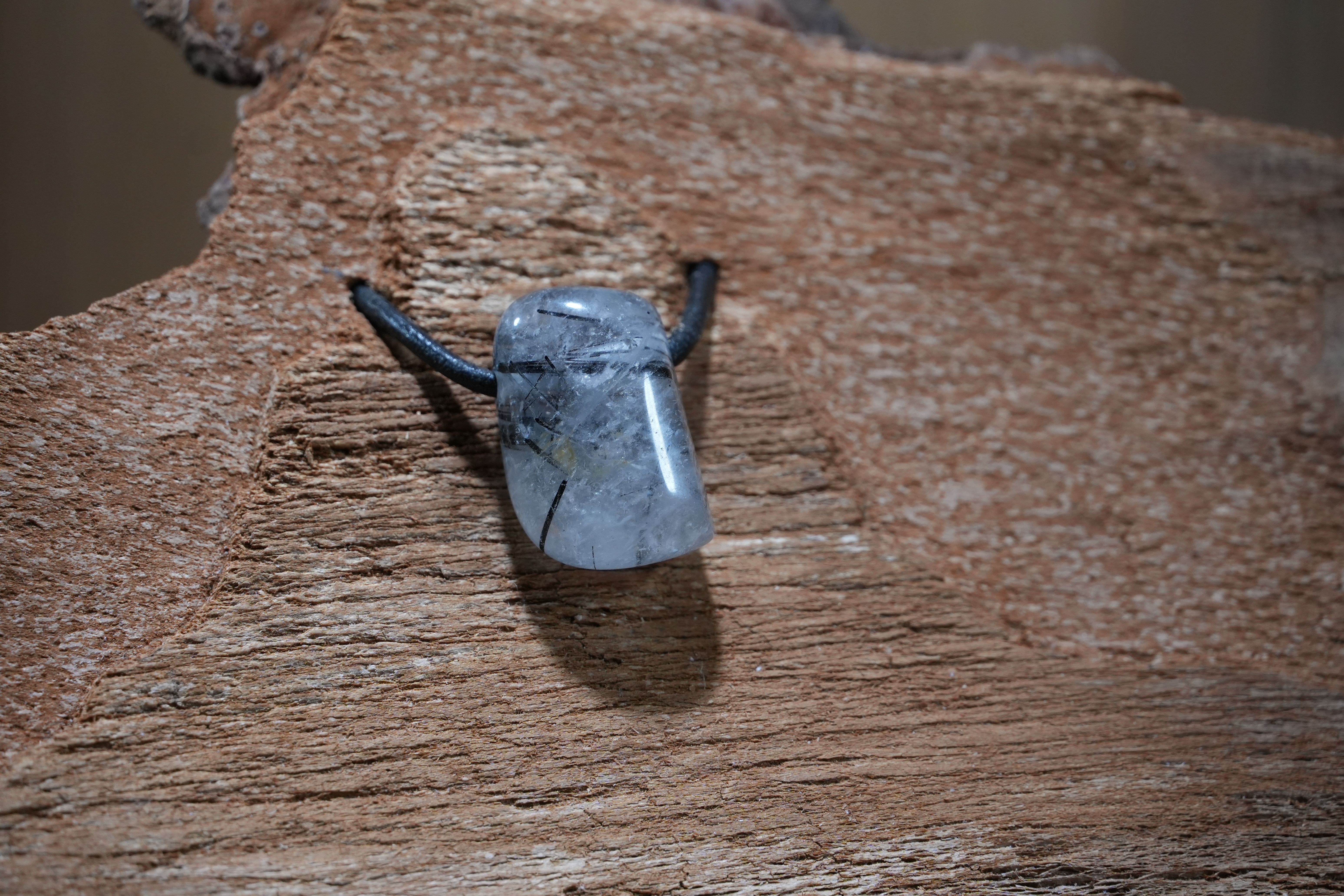 Tourmalinated quartz, Drilled · No. 1, 1.6 × 2.8 cm