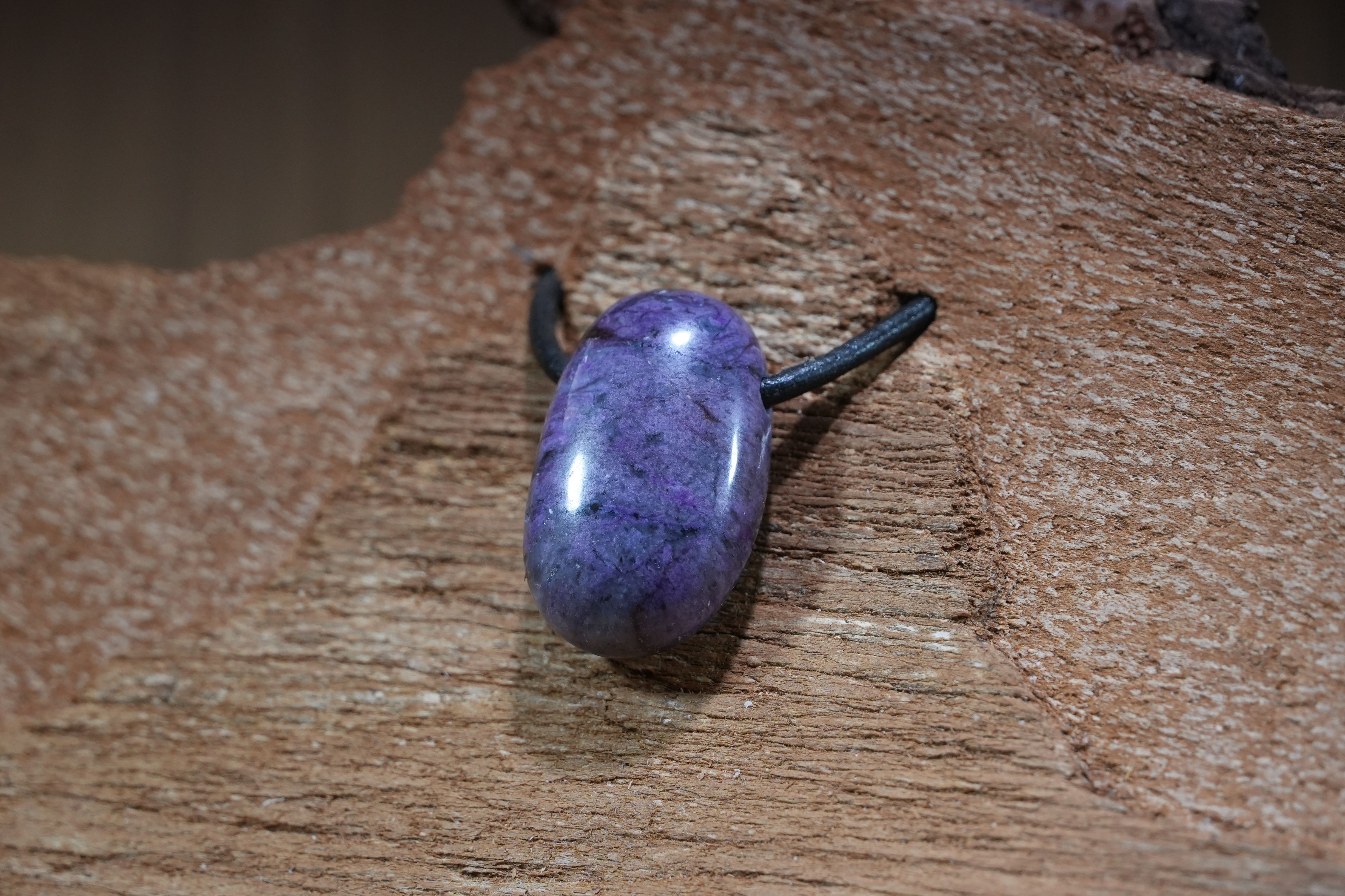 Sugilite, Drilled · No. 1, 1.5 × 3 cm