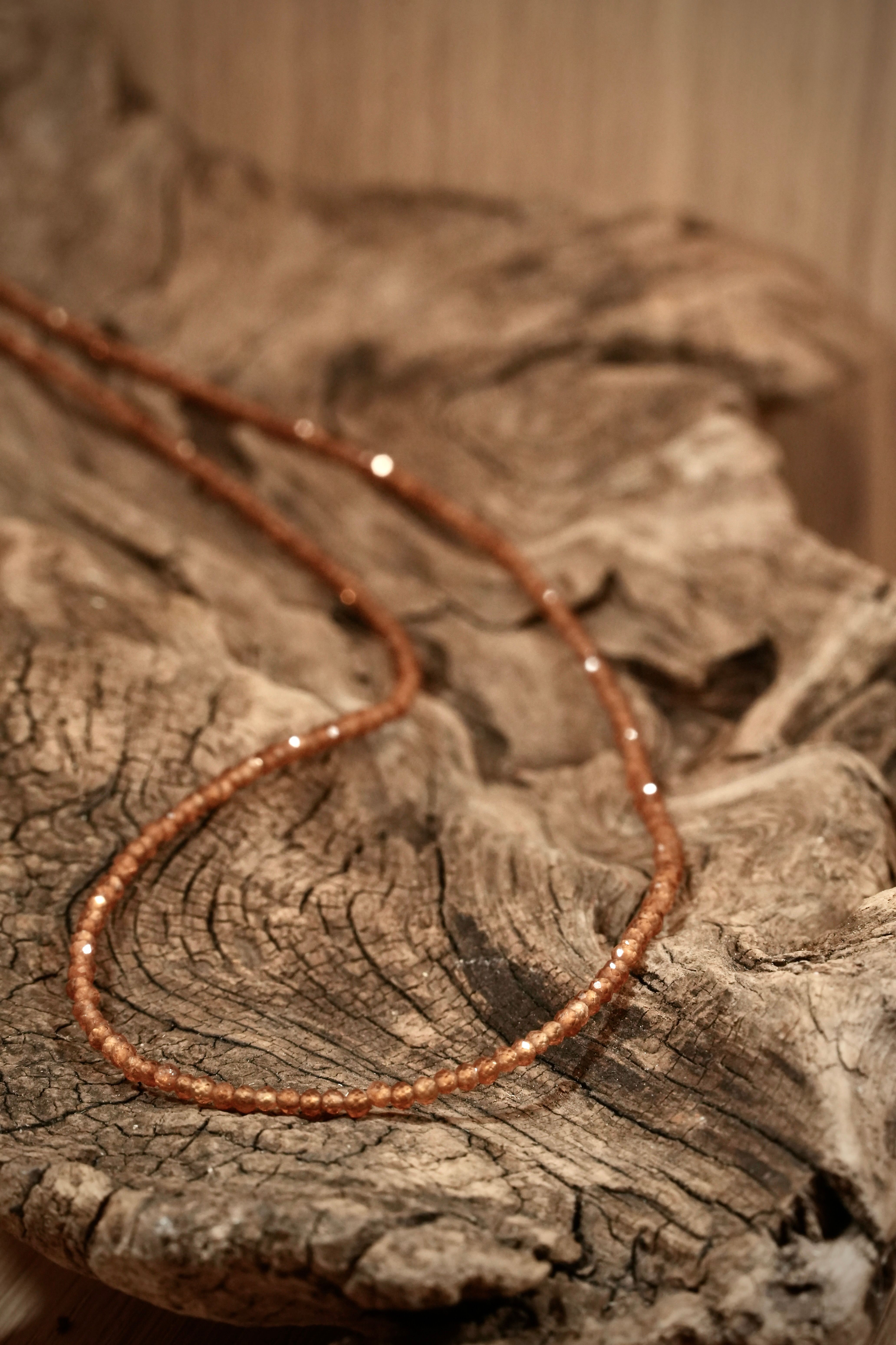 Hessonite Pearls necklace on root wood