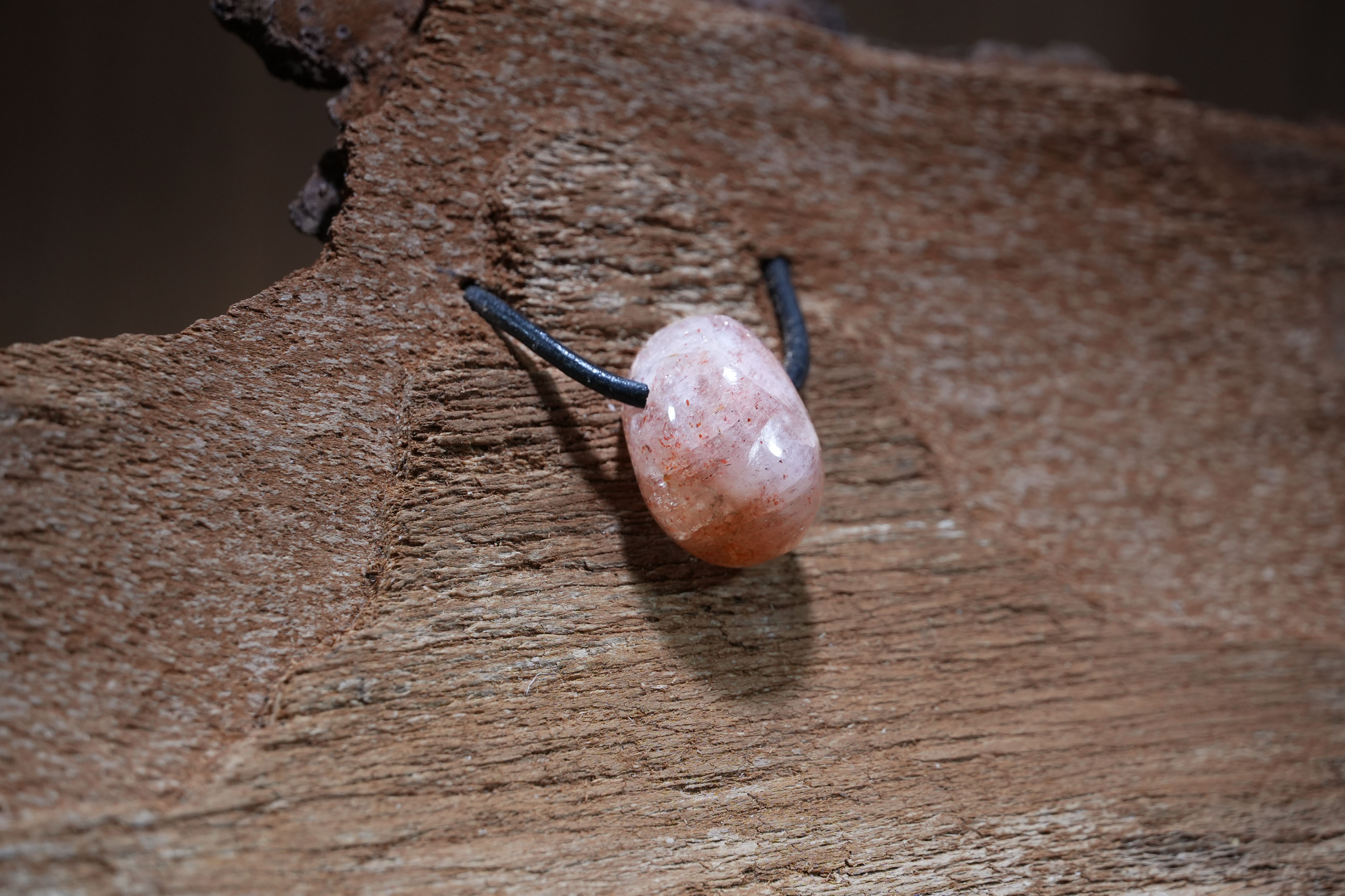 Sunstone, Drilled · No. 1, 1.5 × 2.4 cm